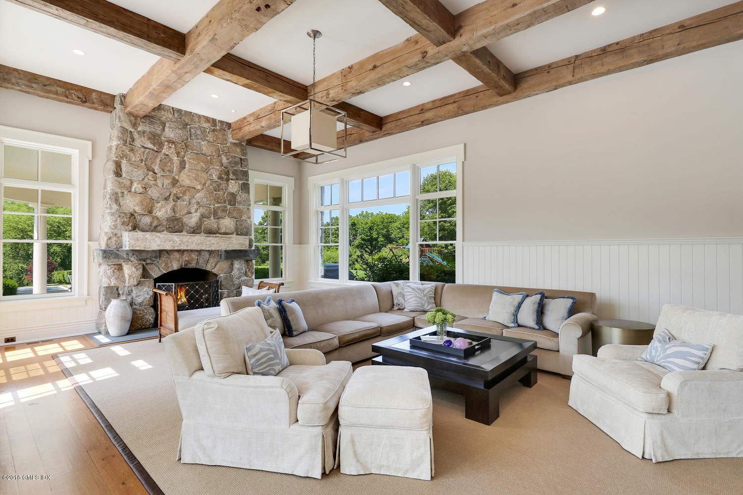 35 Close Road Greenwich, CT 06831 - Photo 19 of 78 a living room with furniture and a fireplace
