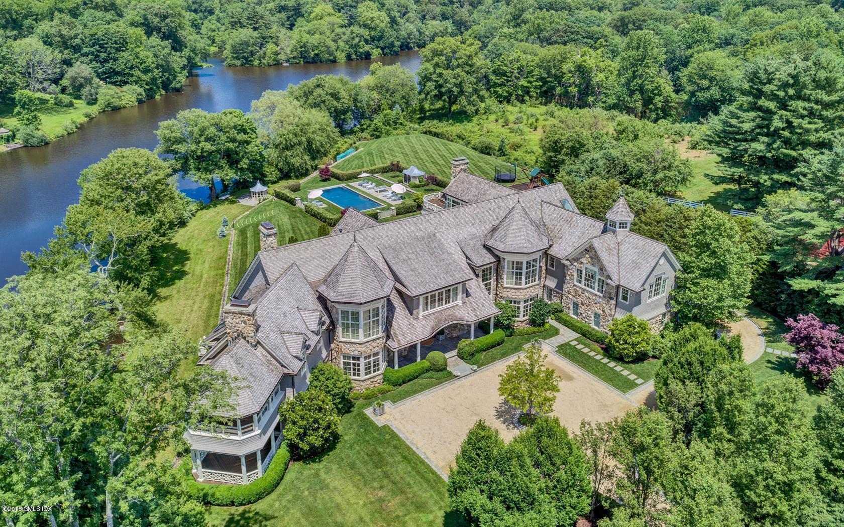 35 Close Road Greenwich, CT 06831 - Photo 3 of 78 an aerial view of a house with a garden and lake view