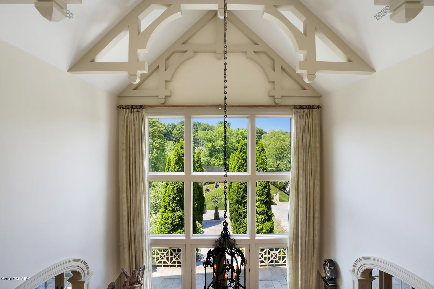 35 Close Road Greenwich, CT 06831 - Photo 32 of 78 a view of a porch with furniture and a yard