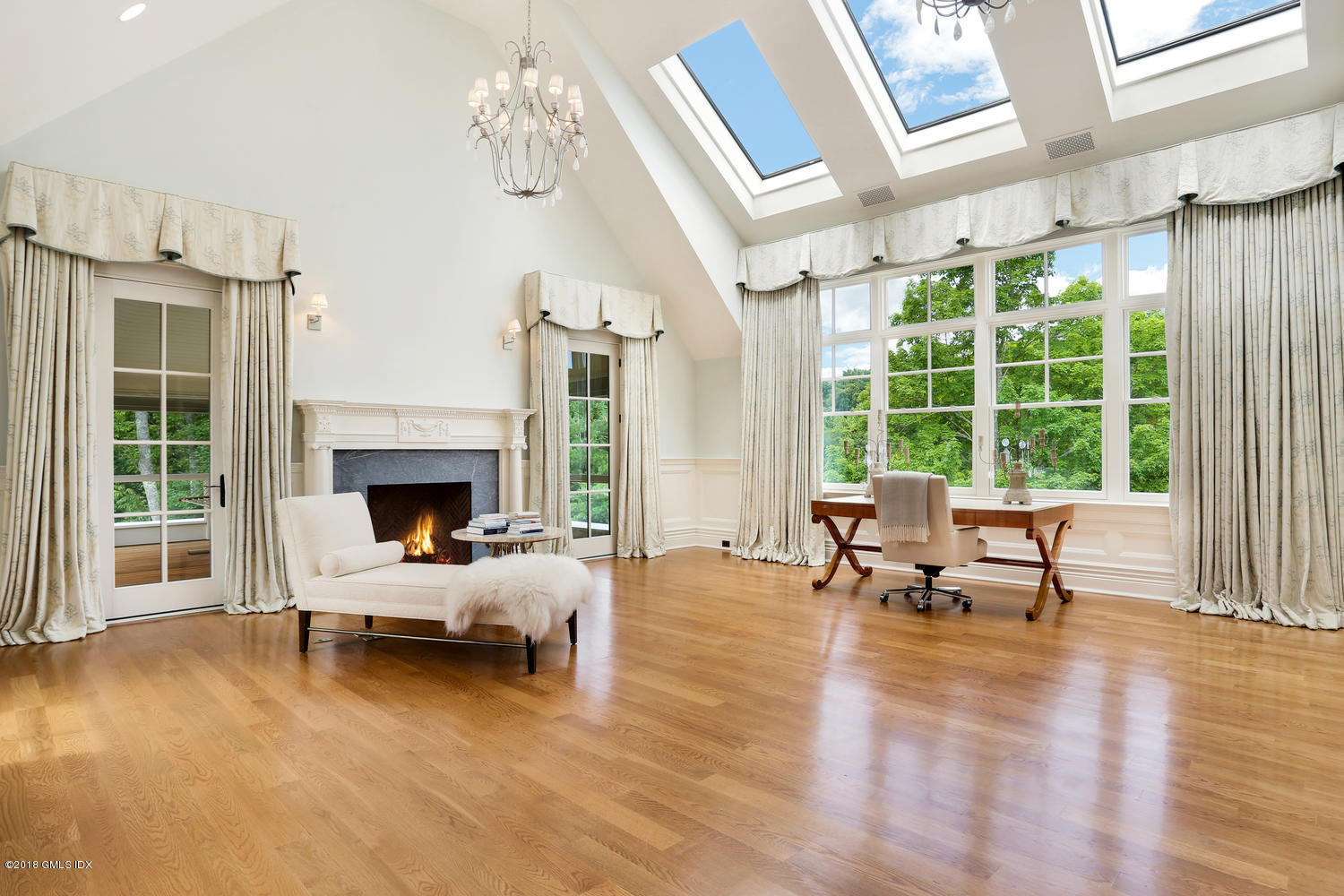 35 Close Road Greenwich, CT 06831 - Photo 37 of 78 a living room with furniture and a fireplace