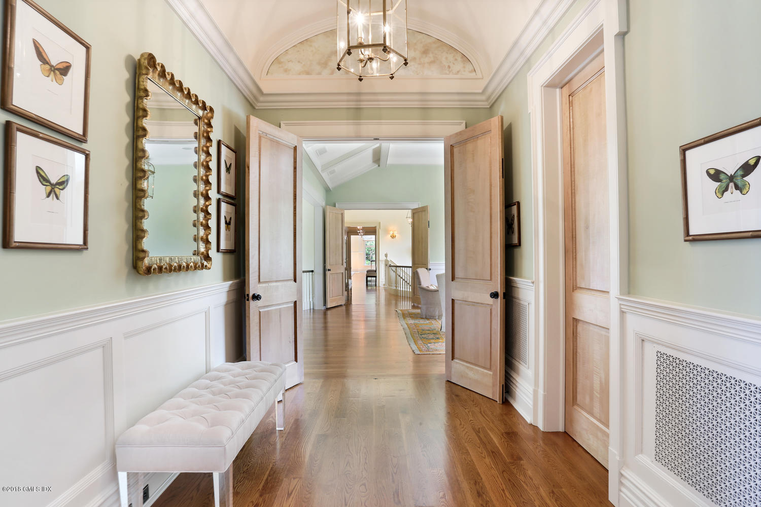 35 Close Road Greenwich, CT 06831 - Photo 40 of 78 a view of a hallway with wooden floor and cabinet