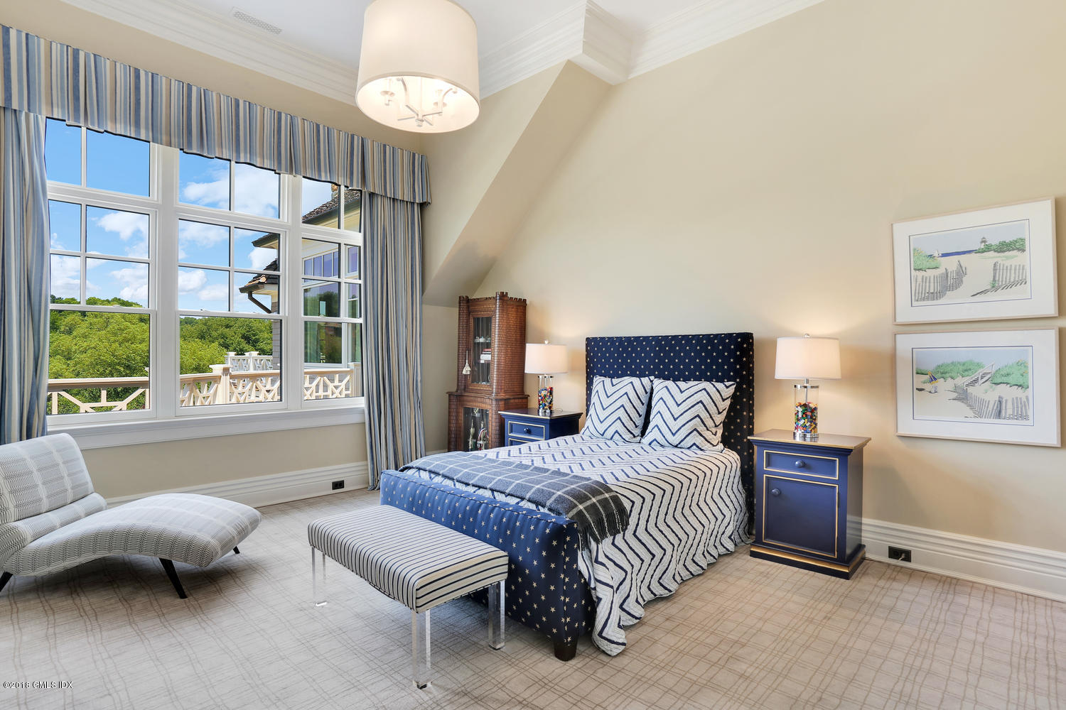 35 Close Road Greenwich, CT 06831 - Photo 46 of 78 a bedroom with a bed and a large window