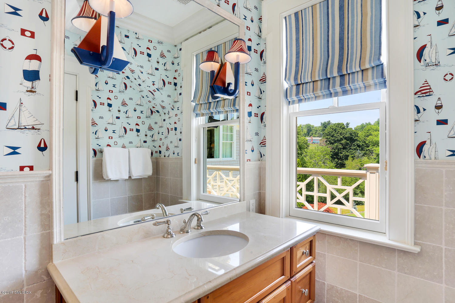35 Close Road Greenwich, CT 06831 - Photo 49 of 78 a bathroom with a sink and a mirror