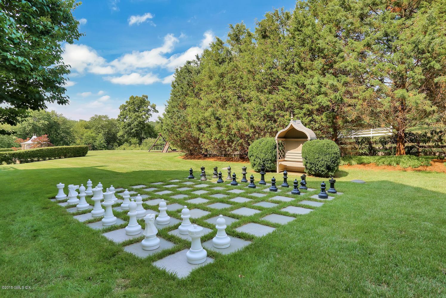35 Close Road Greenwich, CT 06831 - Photo 60 of 78 a garden view with a seating space