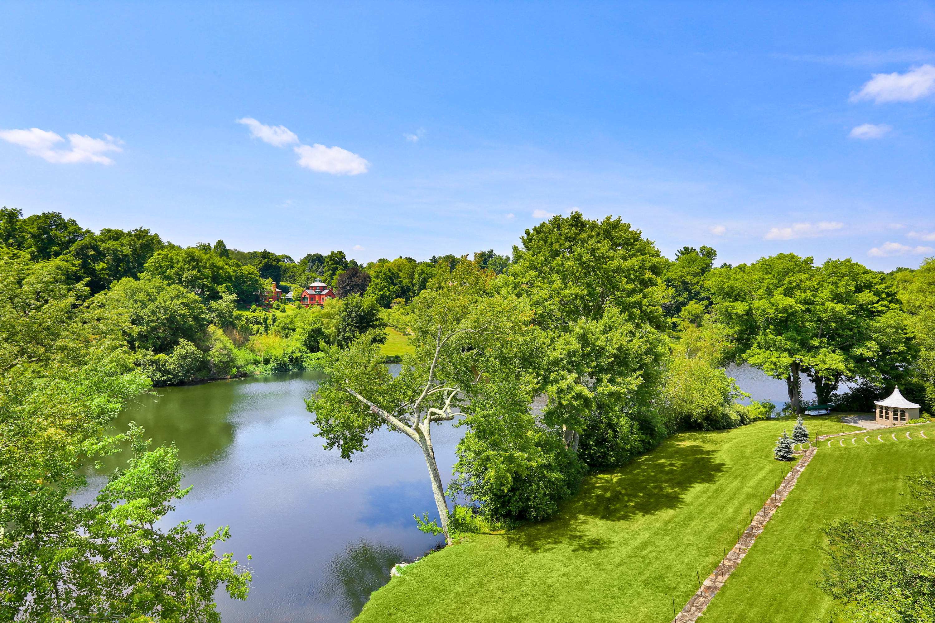 35 Close Road Greenwich, CT 06831 - Photo 61 of 78 a view of a lake with a yard