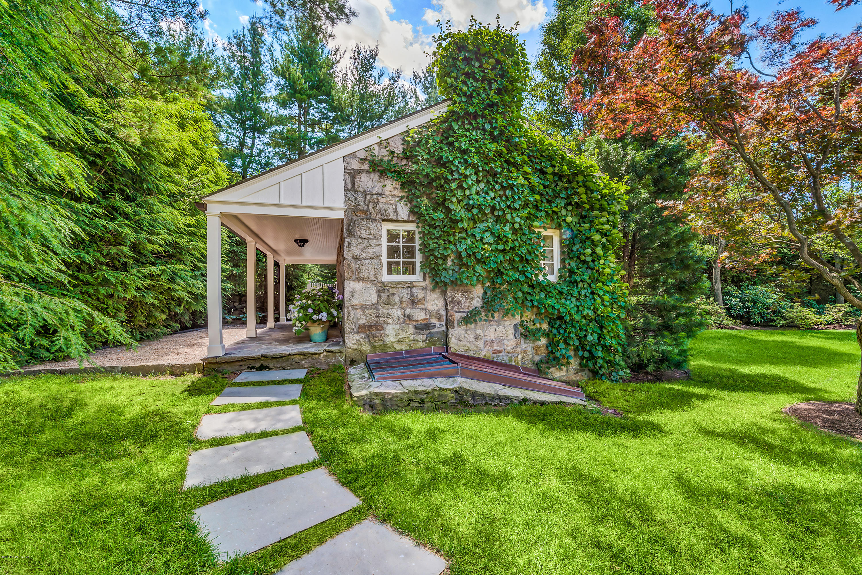 35 Close Road Greenwich, CT 06831 - Photo 65 of 78 a view of a house with a backyard