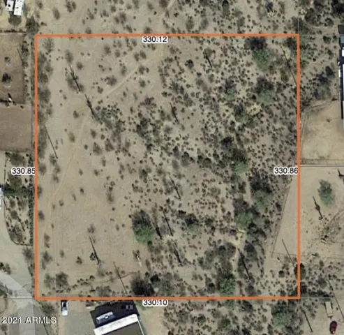 a view of a brick wall with a sink