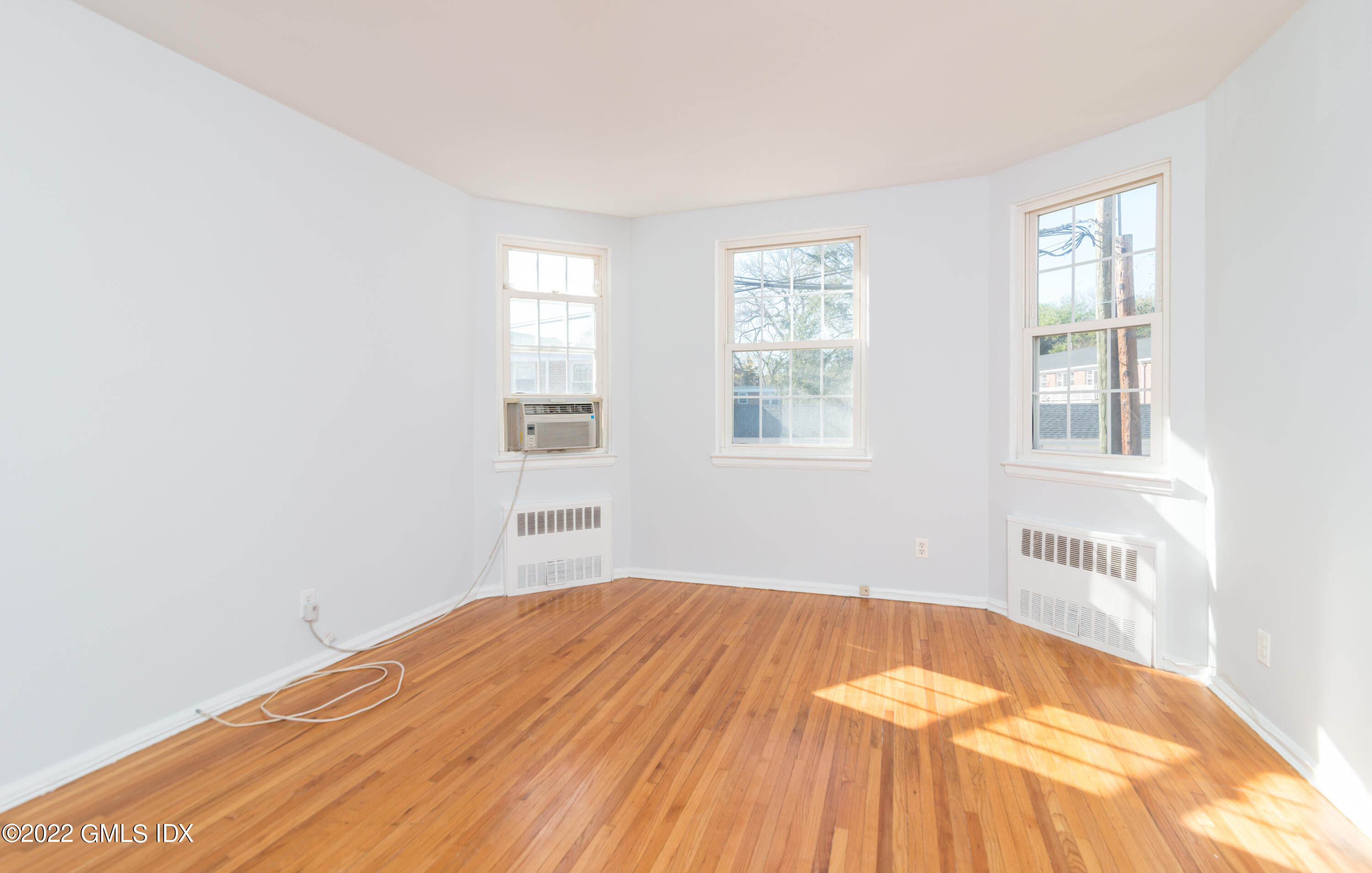 70 Putnam Park, Unit 70 Greenwich, CT 06830 - Photo 18 of 20 an empty room with windows