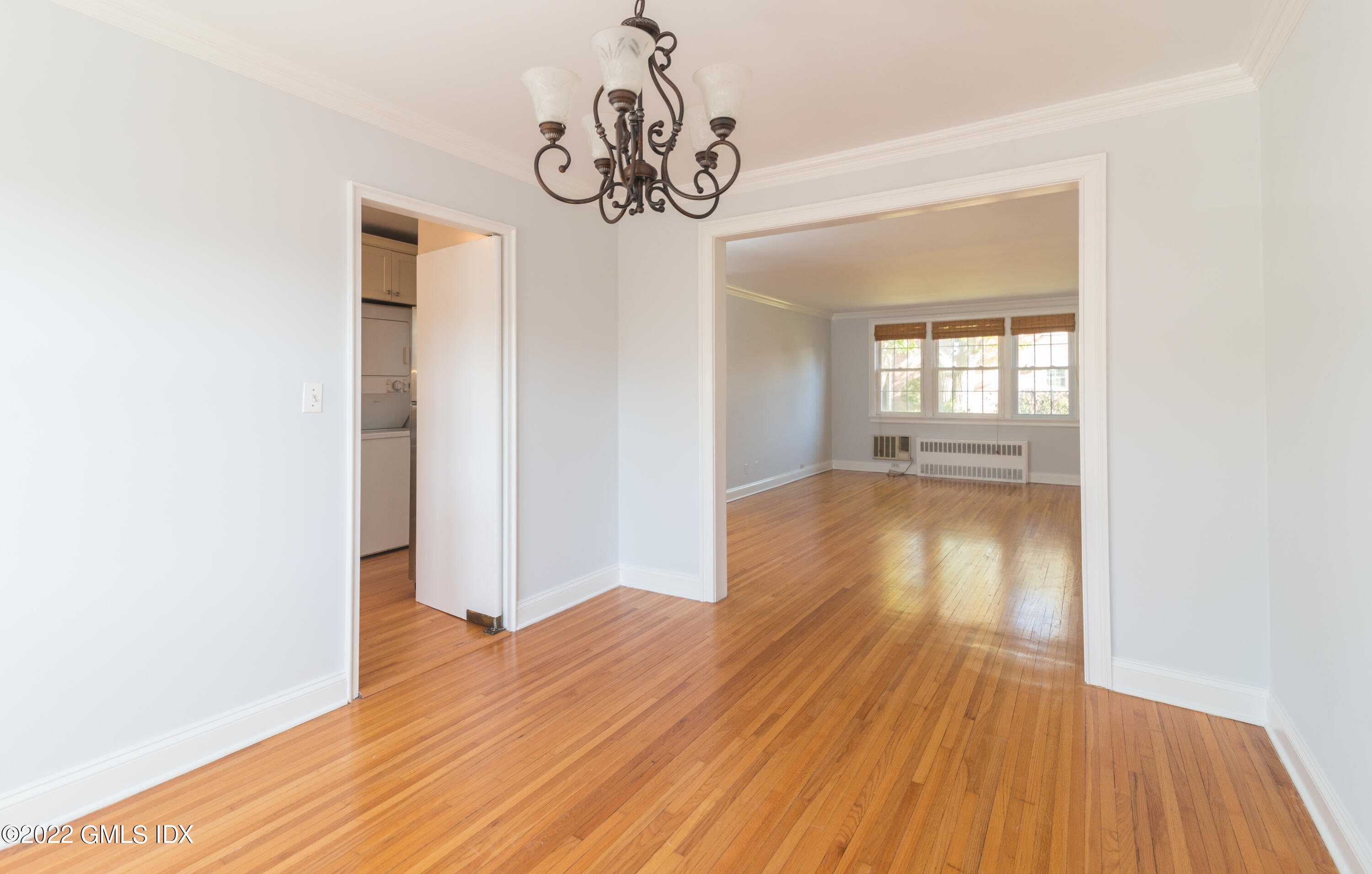 70 Putnam Park, Unit 70 Greenwich, CT 06830 - Photo 9 of 20 a view of empty room with wooden floor and fan