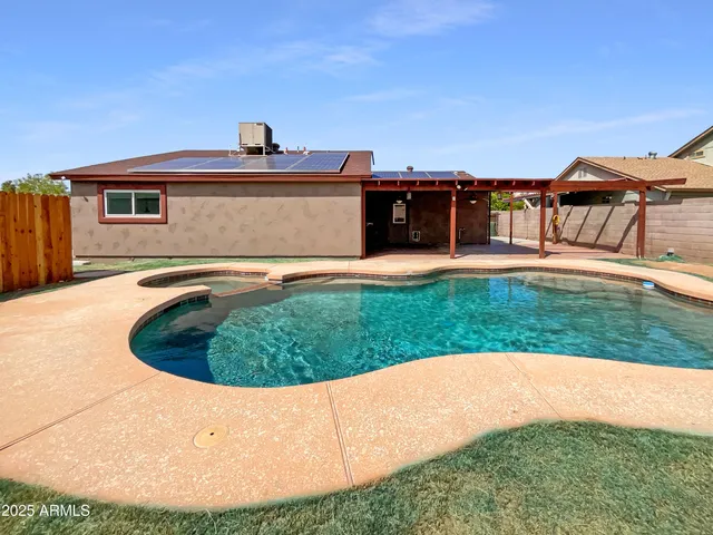 a view of outdoor space yard and swimming pool