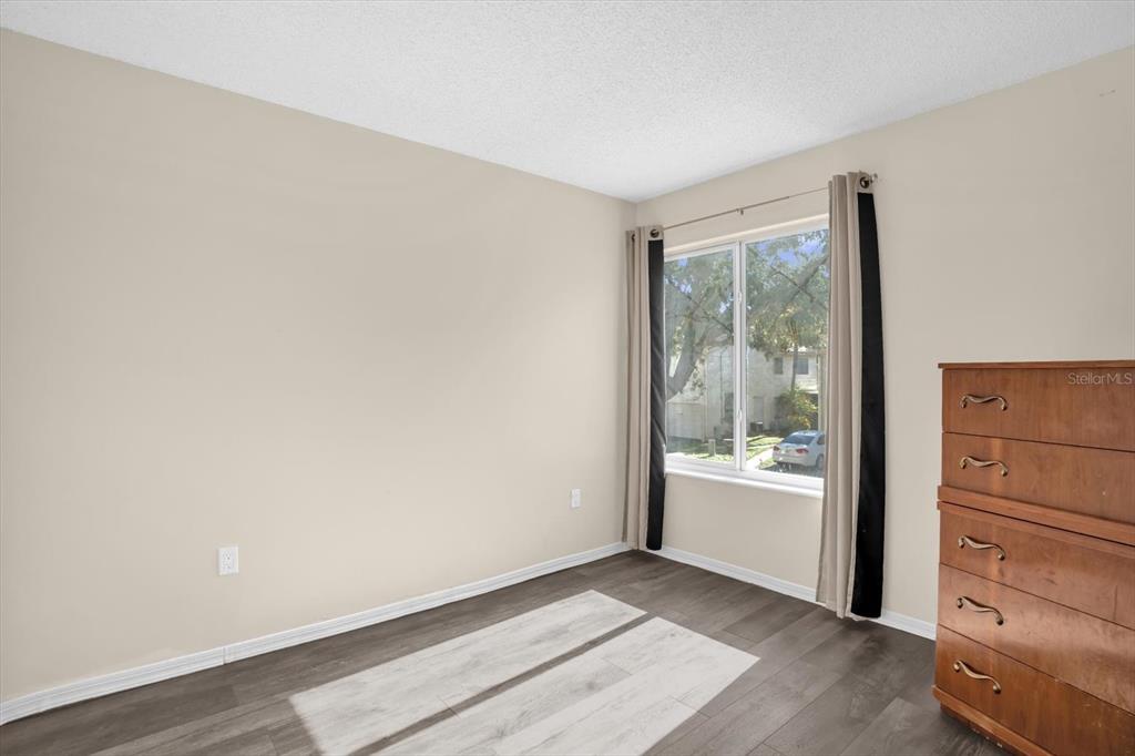 1121 Spring Meadow Drive, Unit 11221 Kissimmee, FL 34741 - Photo 20 of 28 a view of an empty room and window