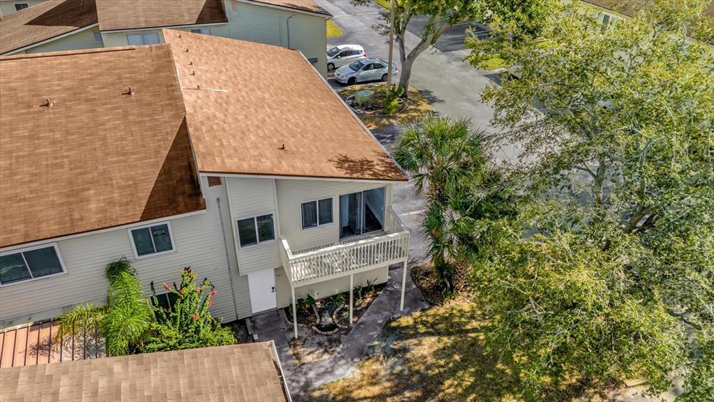1121 Spring Meadow Drive, Unit 11221 Kissimmee, FL 34741 - Photo 26 of 28 aerial view of a house with a yard