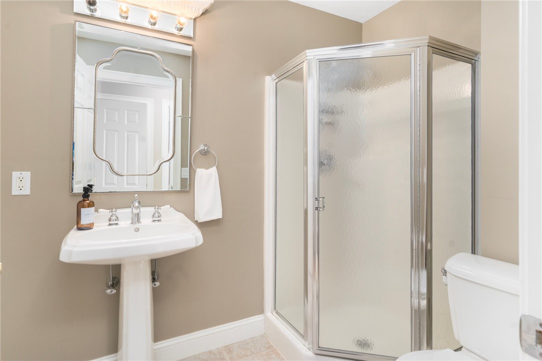 132 Channel View, Unit 3 Warwick, RI 02889 - Photo 21 of 50 Downstairs, Hall bath with laundry area.