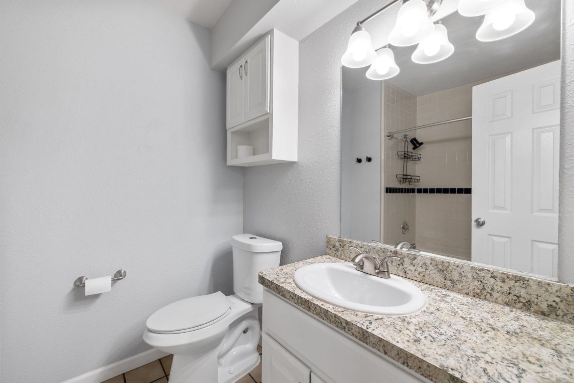 805 Sabinas Court Georgetown, TX 78628 - Photo 14 of 28 The primary en suite has an extended vanity making mornings a bit easier.