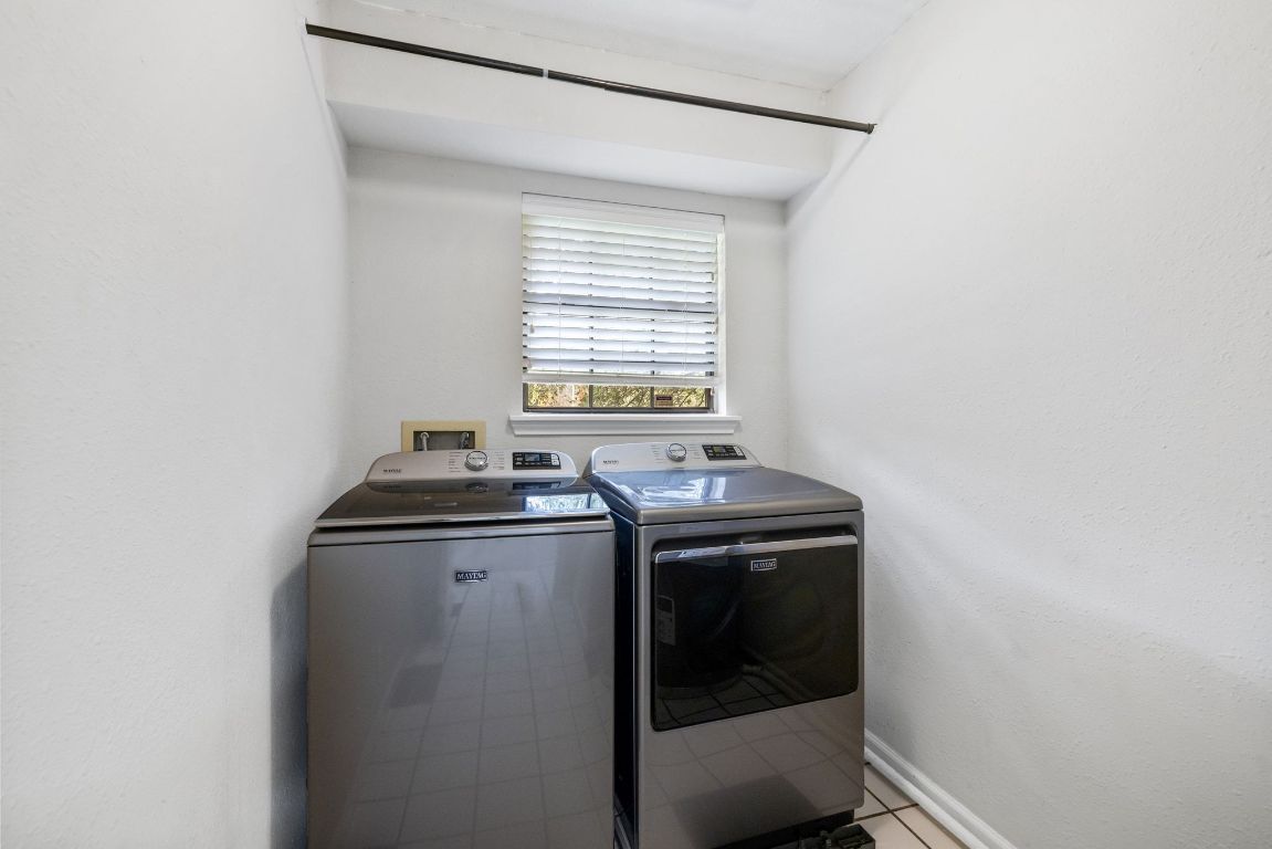 805 Sabinas Court Georgetown, TX 78628 - Photo 20 of 28 Laundry room with washer & dryer!