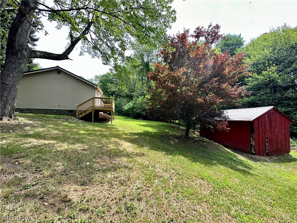 48963 Bloomfield Road East Liverpool, OH 43920 - Photo 23 of 25 View of yard featuring a deck