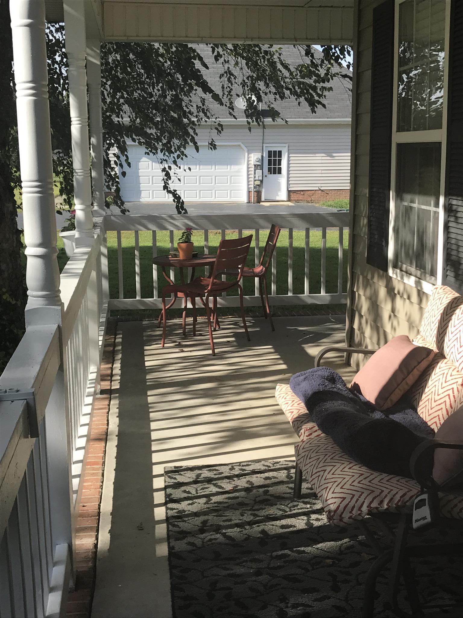 501 Rock Road Morrison, TN 37357 - Photo 3 of 22 a view of a chairs and table in a patio