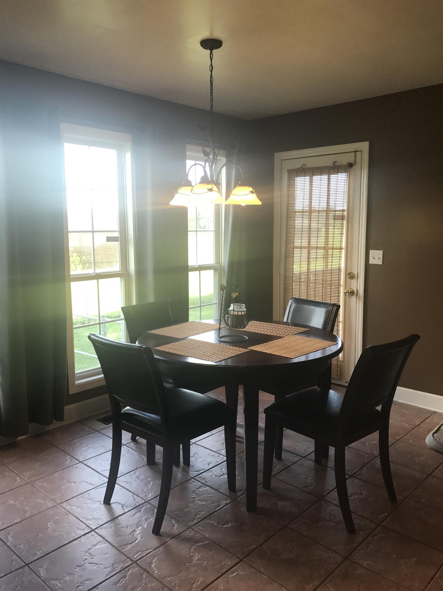 501 Rock Road Morrison, TN 37357 - Photo 9 of 22 a view of a dining room with furniture and window