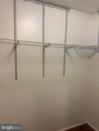 a view of small space with racks on the wall