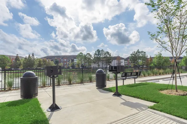 a garden view with a fountain