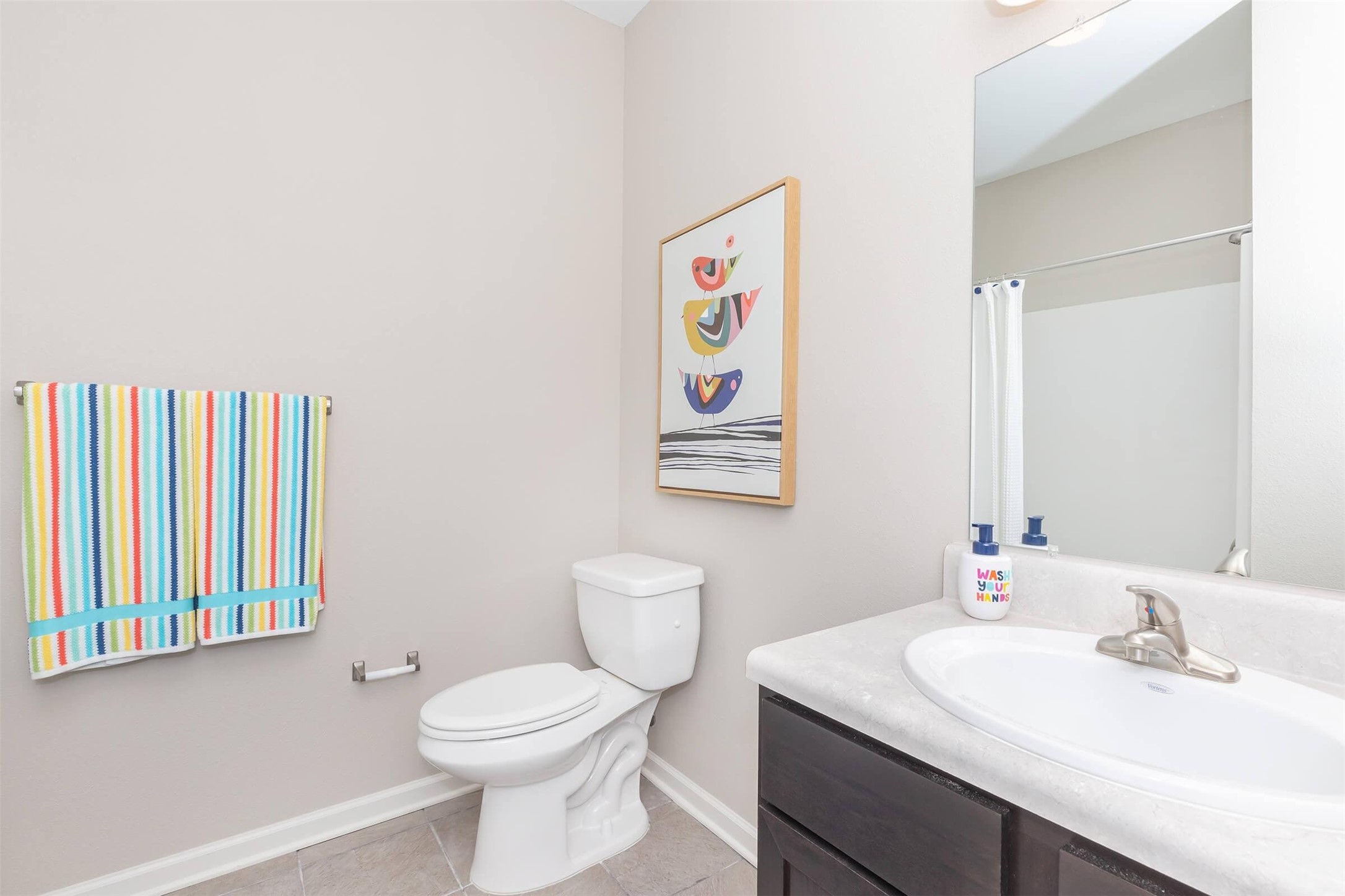 11777 Nicholson Drive Baton Rouge, LA 70810 - Photo 24 of 24 a bathroom with a sink a toilet and a mirror