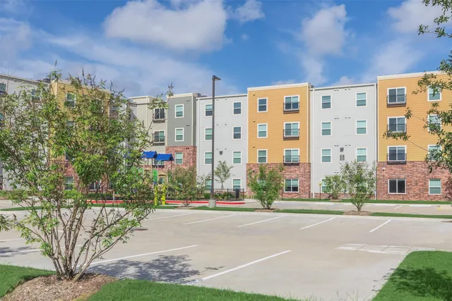 a view of a building with a street