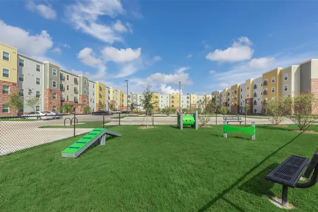 a view of a garden with a slide