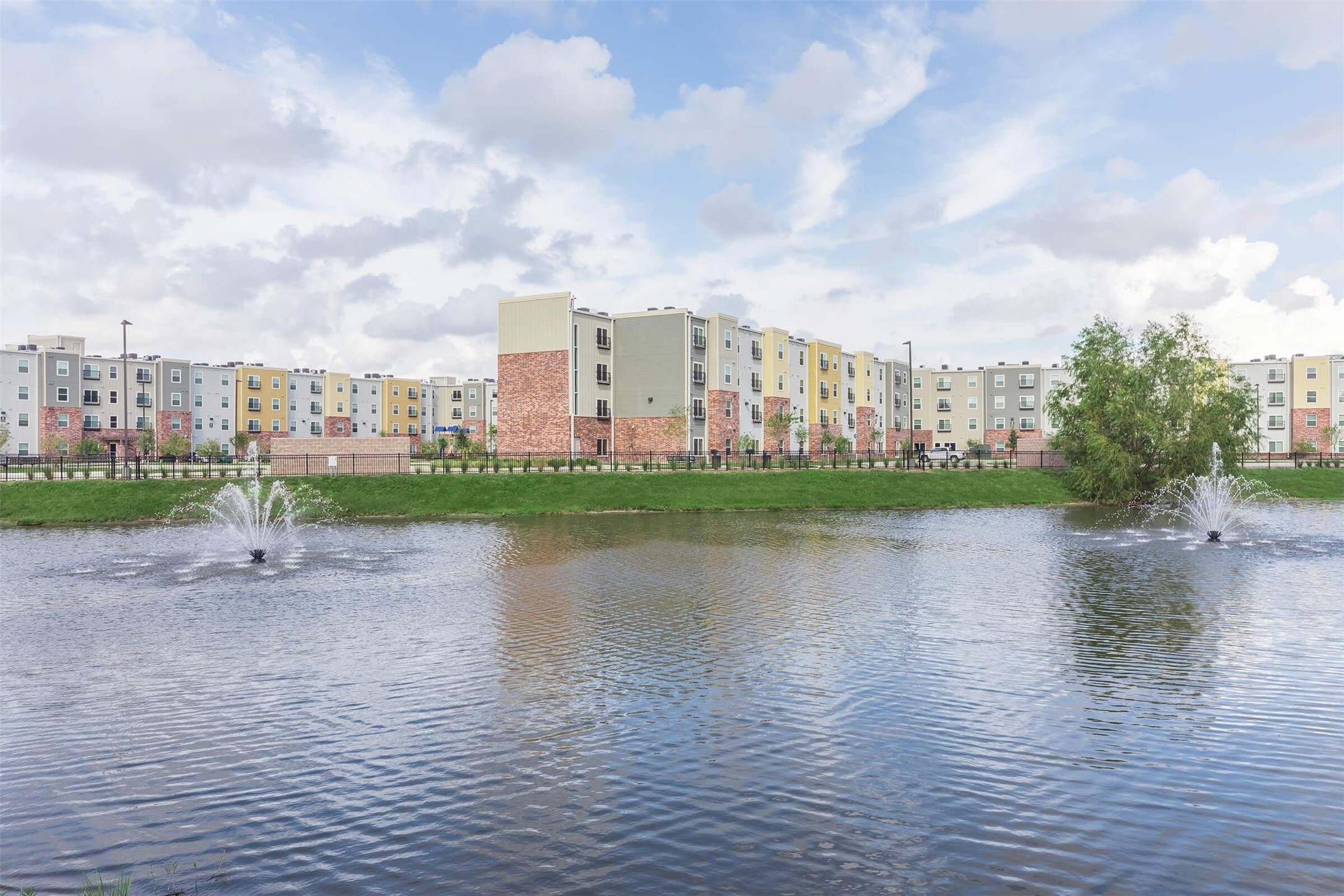 11777 Nicholson Drive Baton Rouge, LA 70810 - Photo 10 of 24 a view of a lake with houses in the back