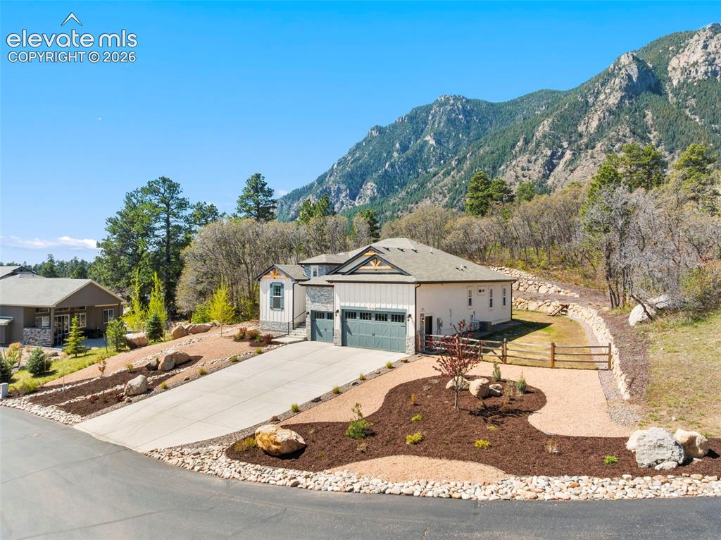5375 Old Star Ranch View Colorado Springs, CO 80906 - Photo 2 of 47 Contemporary exterior with a multi-car driveway and an attached garage