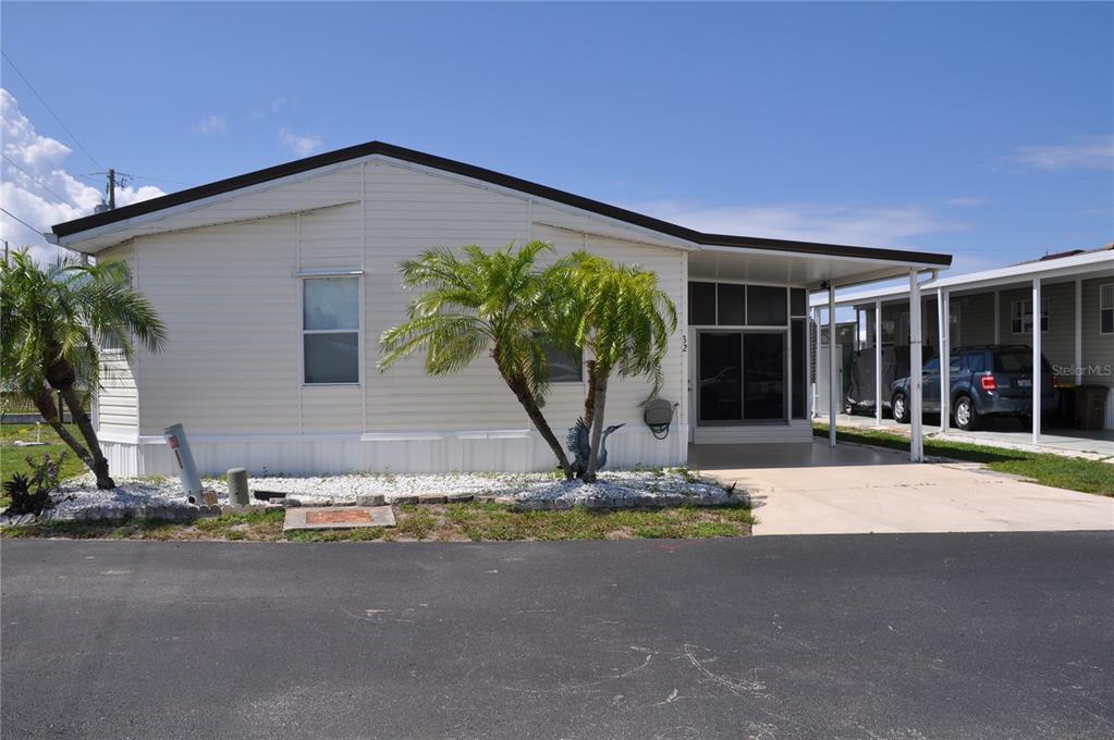10101 Burnt Store Road, Unit 200 Punta Gorda, FL 33950 - Photo 1 of 1 UNIT #32-ALOE AVENUE WATERFRONT