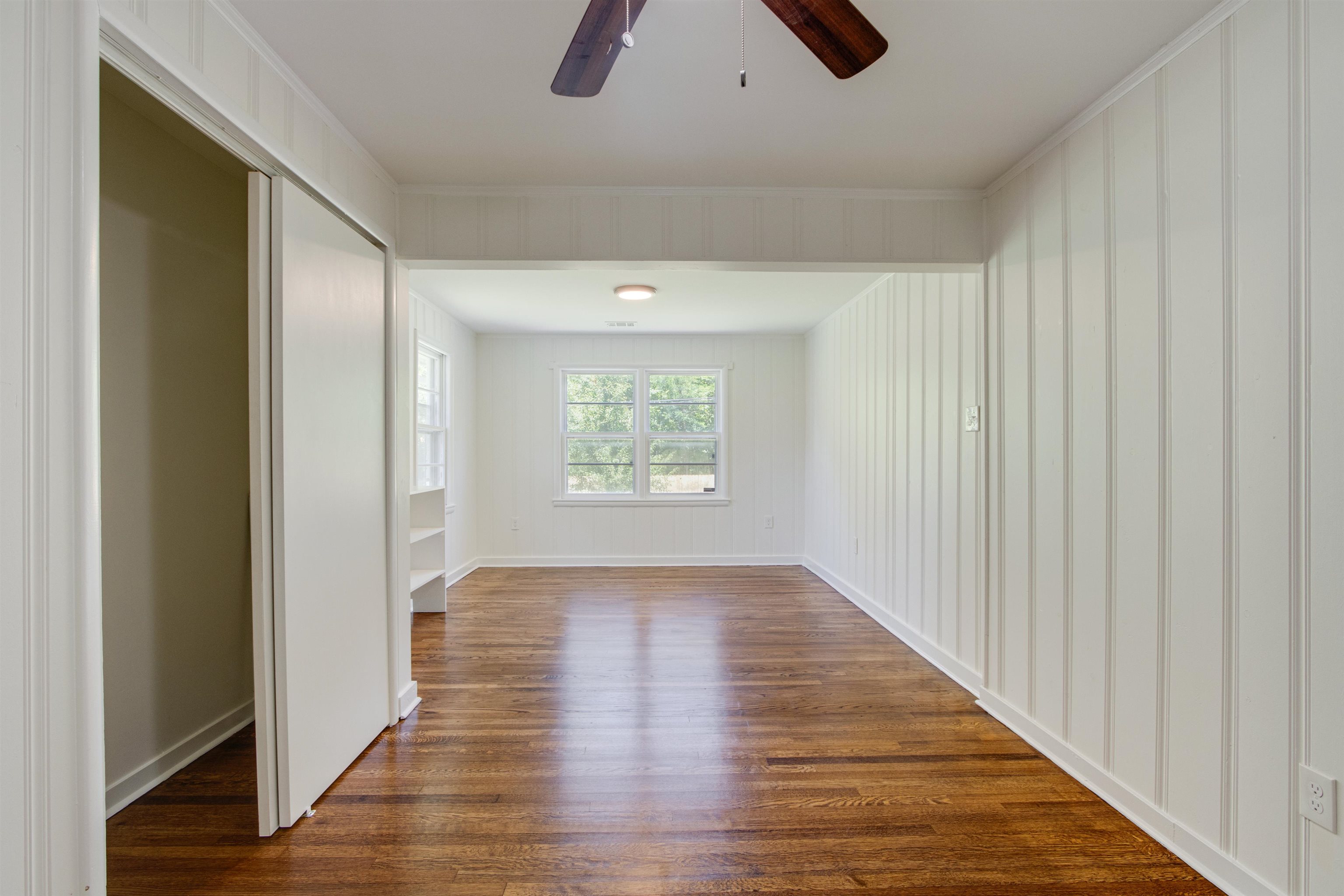 5418 Mesquite Road Memphis, TN 38120 - Photo 17 of 21 Spare room with dark wood-type flooring and ceiling fan