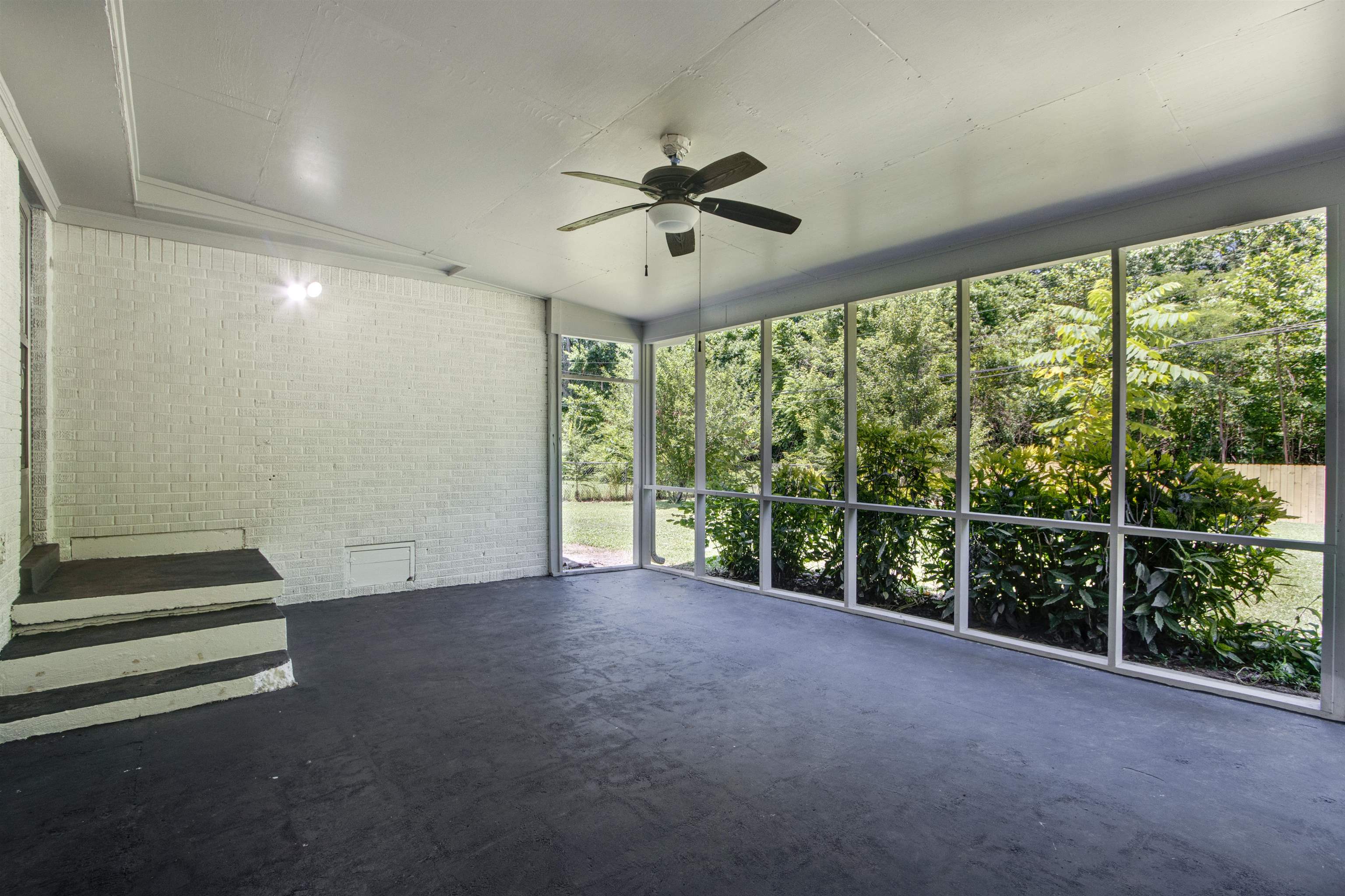 5418 Mesquite Road Memphis, TN 38120 - Photo 20 of 21 Unfurnished sunroom featuring ceiling fan