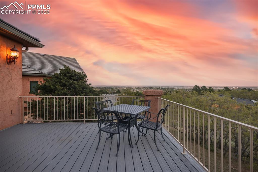 4215 Star Ranch Road Colorado Springs, CO 80906 - Photo 36 of 44 a view of a roof deck with table and chairs
