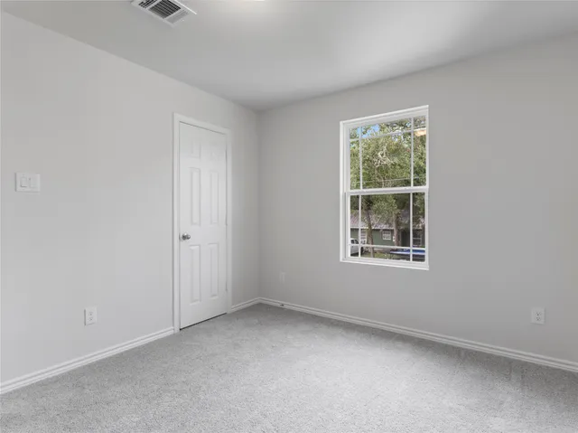 an empty room with a window