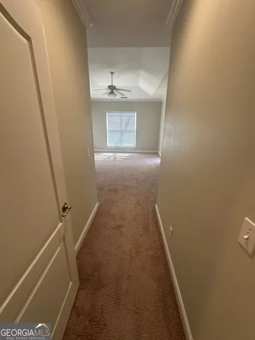 a view of a room with racks on the wall