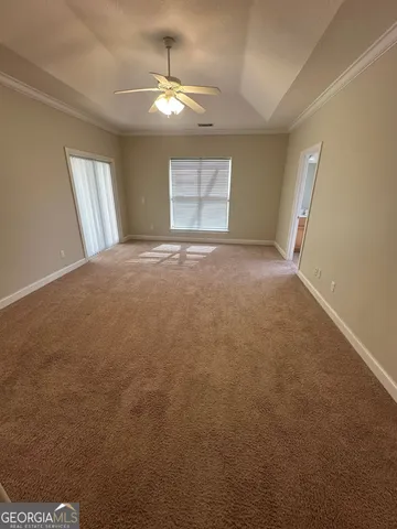a view of an empty room and window
