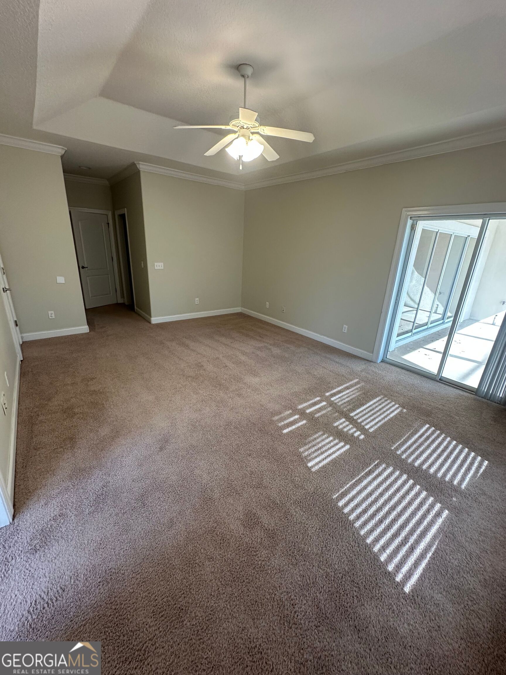 39 Coastal Walk St. Marys, GA 31558 - Photo 17 of 23 a view of an empty room with glass door