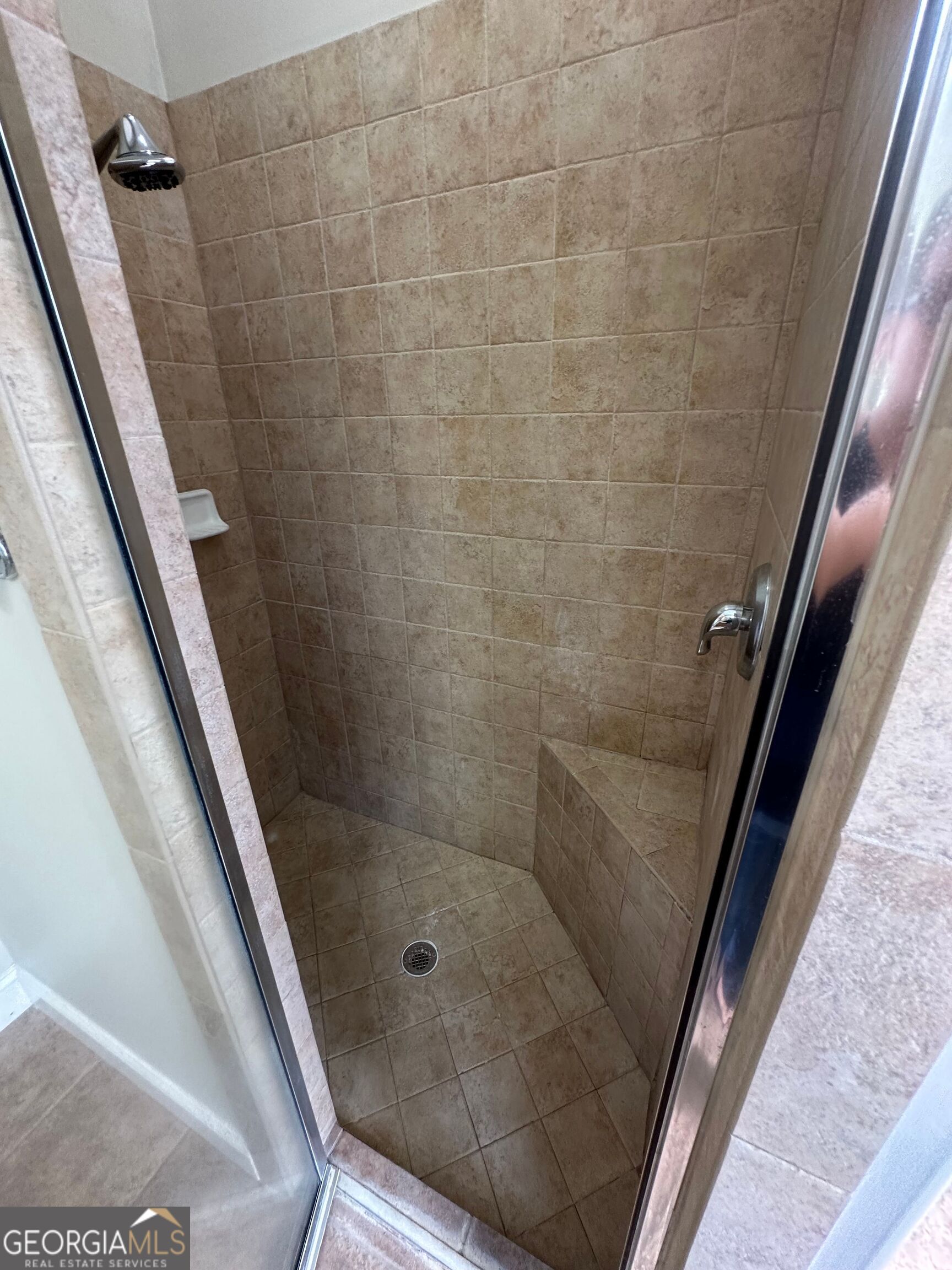 39 Coastal Walk St. Marys, GA 31558 - Photo 20 of 23 a bathroom with a shower