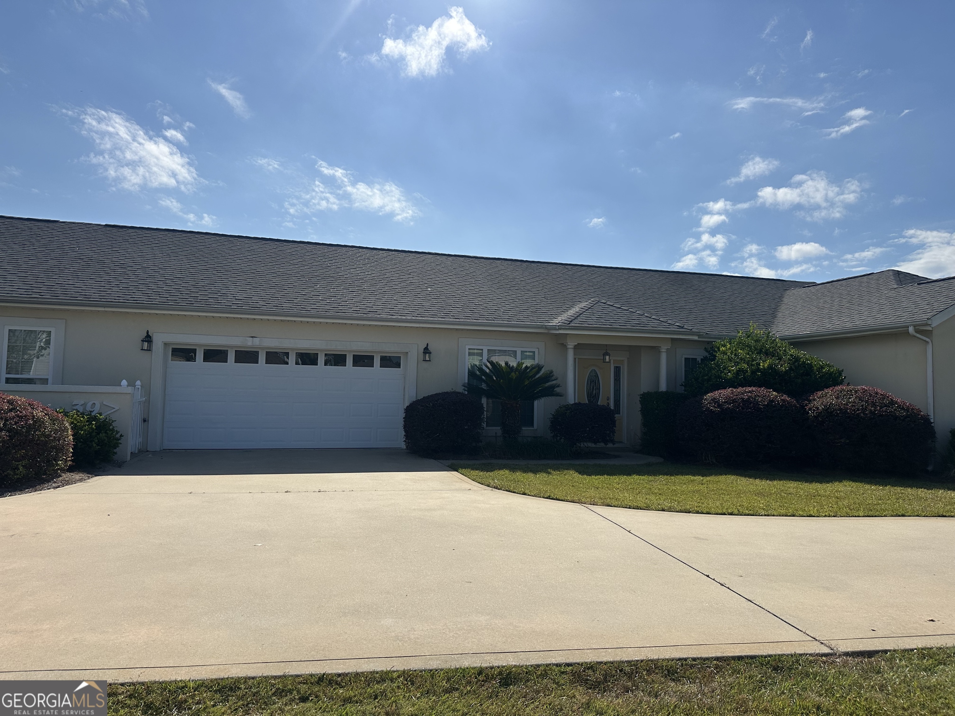39 Coastal Walk St. Marys, GA 31558 - Photo 2 of 23 a view of swimming pool with outdoor seating and a yard