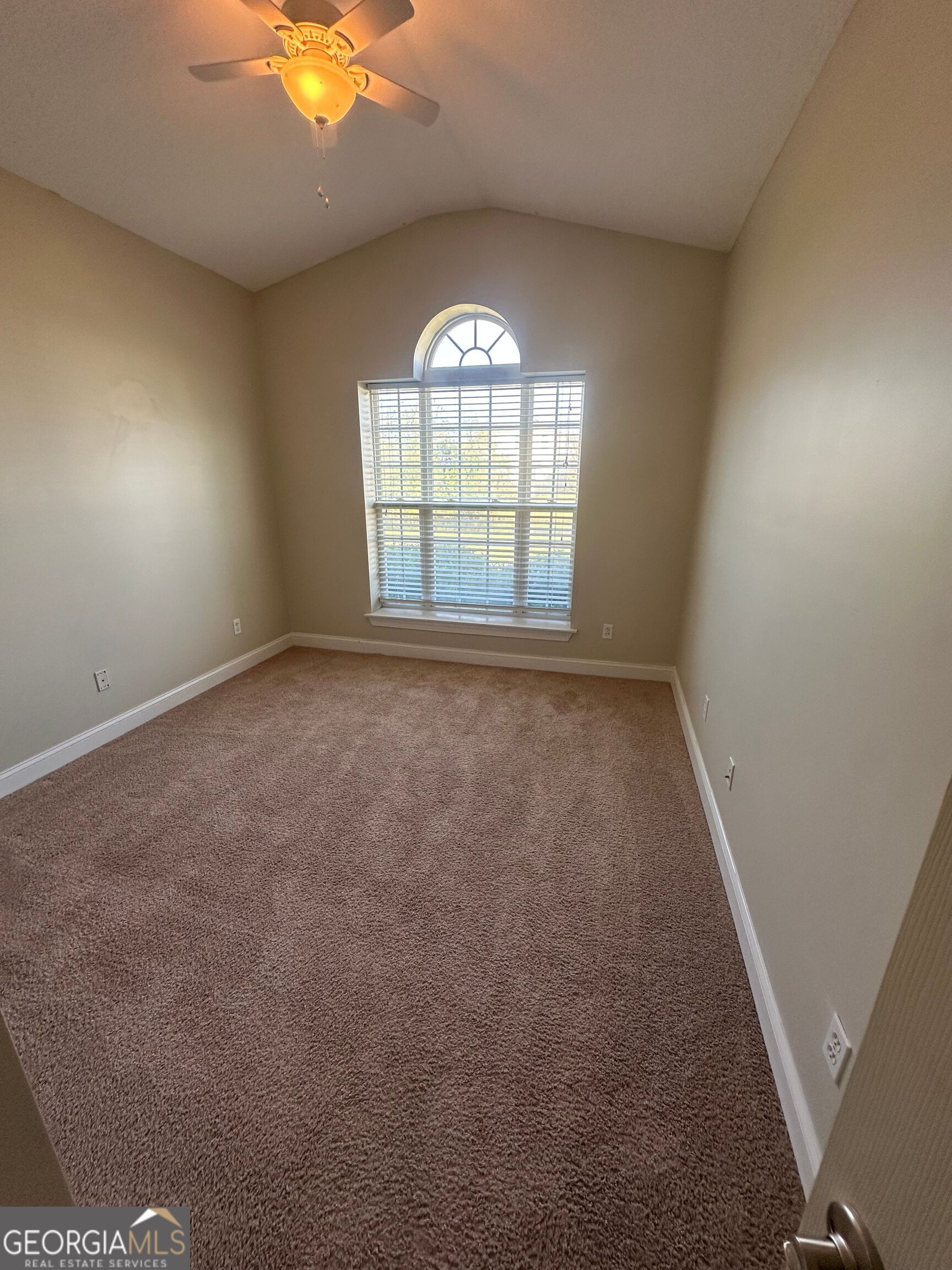 39 Coastal Walk St. Marys, GA 31558 - Photo 6 of 23 an empty room with windows