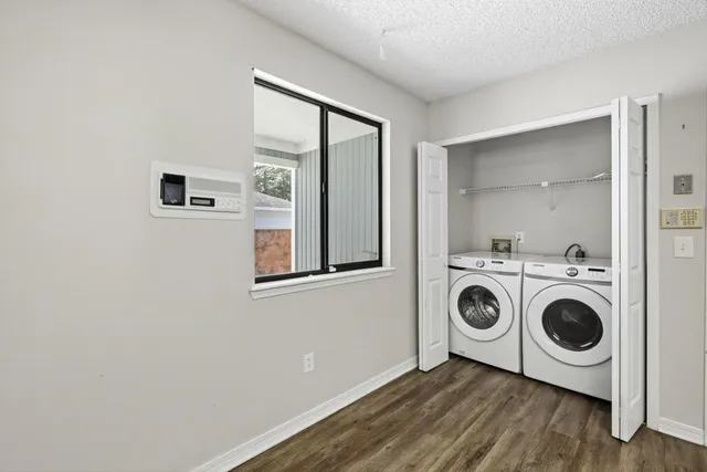 a utility room with dryer and washer