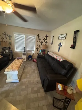 a living room with furniture and a window