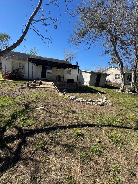 10420 6th Street Pettus, TX 78146 - Photo 22 of 30 a front view of a house with a yard