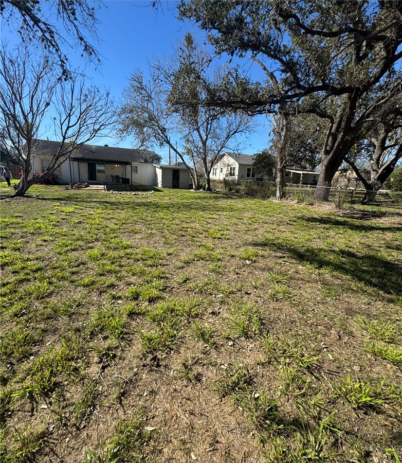 10420 6th Street Pettus, TX 78146 - Photo 26 of 30 a front view of a house with a yard