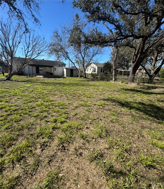 10420 6th Street Pettus, TX 78146 - Photo 26 of 30 a front view of a house with a yard