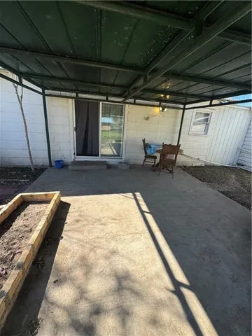 a view of a backyard of a house