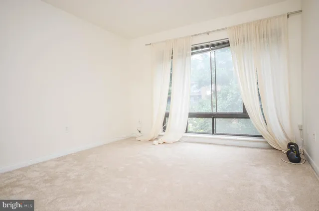 an empty room with window