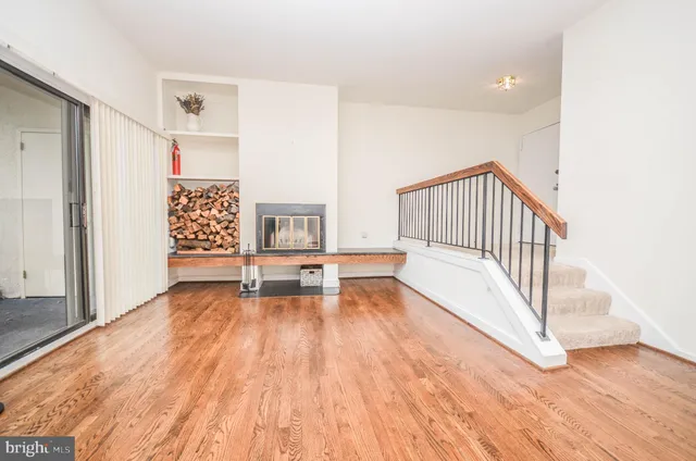 a view of livingroom with furniture and hardwood floor