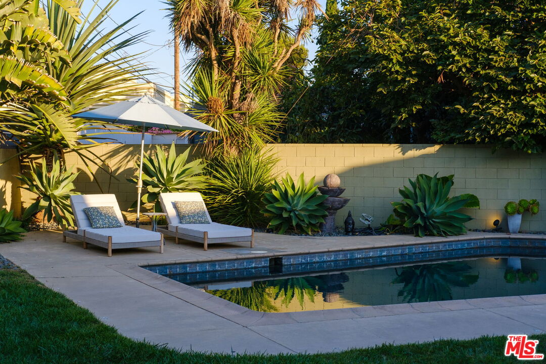 12416 Aneta Street Los Angeles, CA 90066 - Photo 15 of 22 a view of swimming pool with chairs