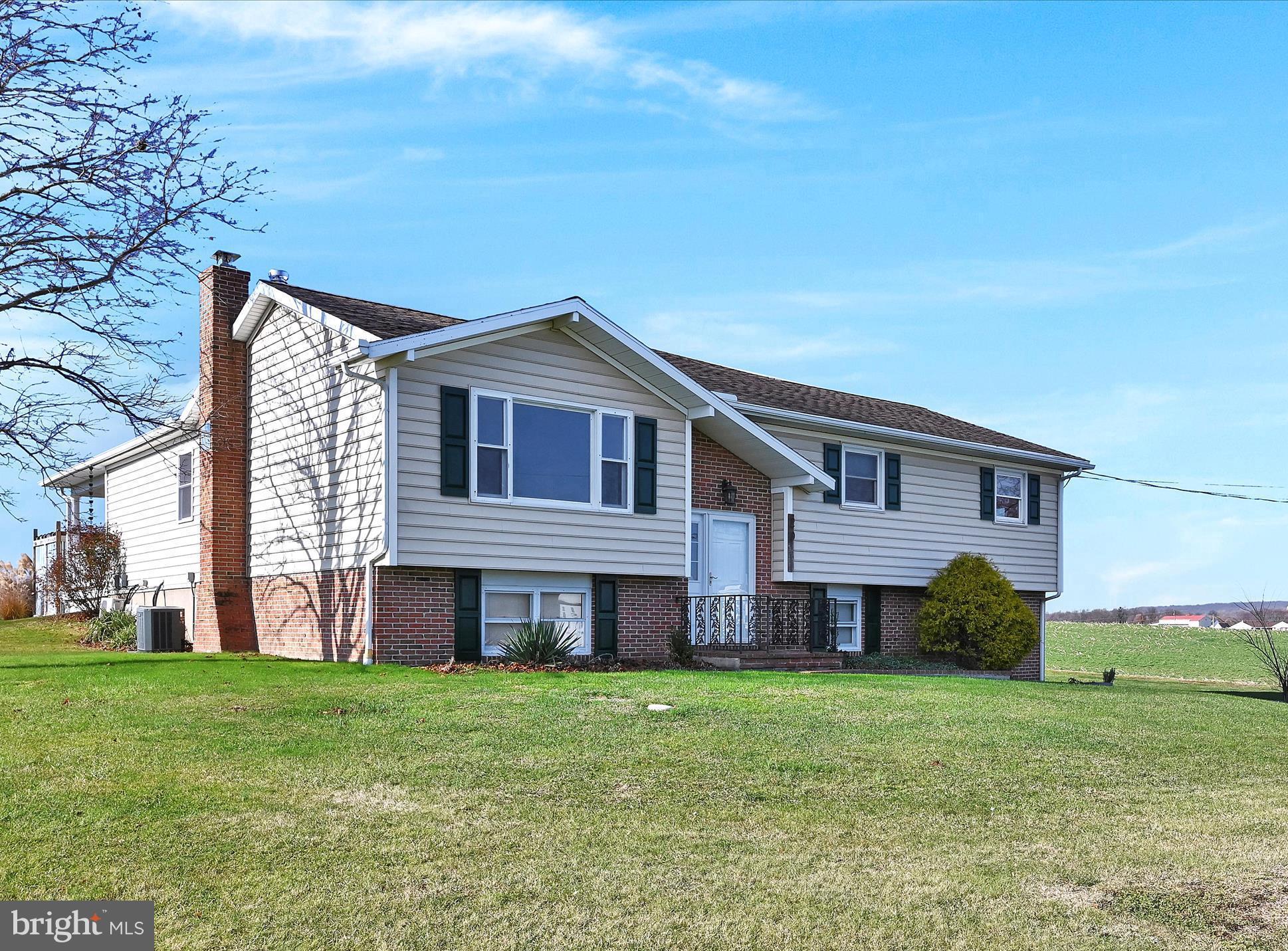20 Bomberger Road Lititz, PA 17543 - Photo 1 of 50 a front view of a house with a yard
